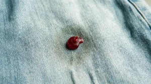 coloured candle wax stain on denim fabric